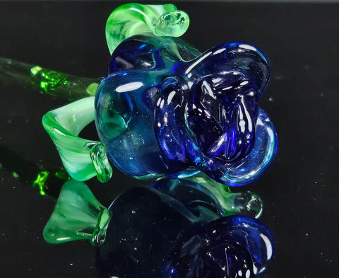 a close up of a glass object on a table